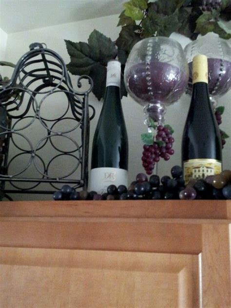 Wine kitchen decor ideas and cool inspirations. Wine Decor...hmmm! Place candles inside the wine glasses w ...