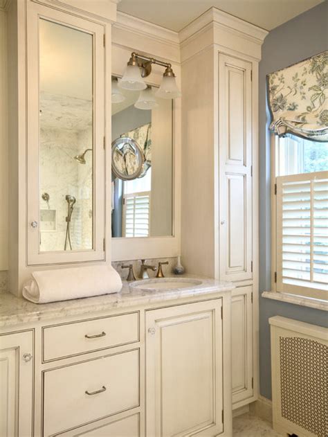 This vanity includes a concealed drawer inside for easy storage. Linen Tower | Houzz