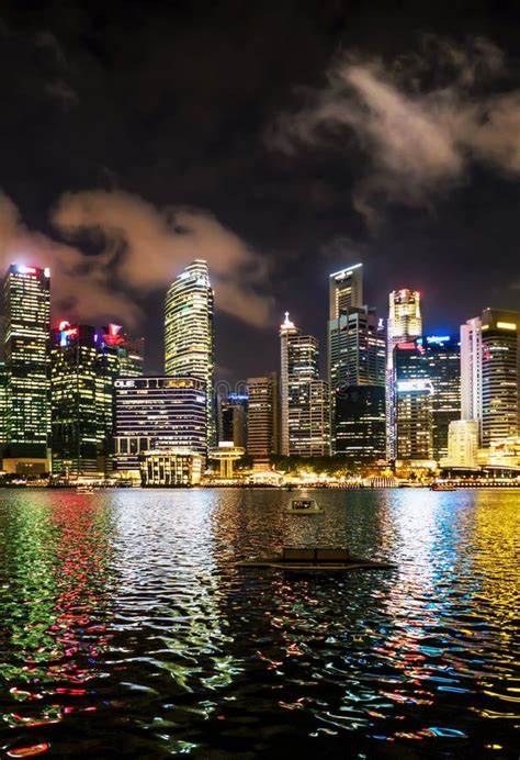 Singapore Skyline Of Downtown Core In Marina Bay At Dusk Editorial