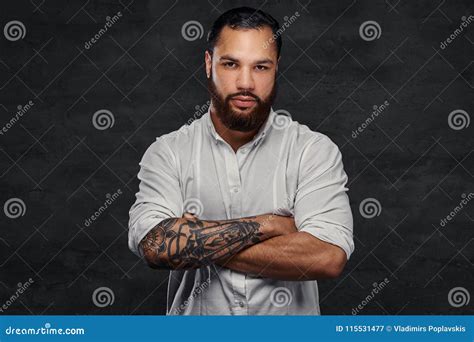 Portrait Of A Handsome African American Tattooed Man With Stylish Hair