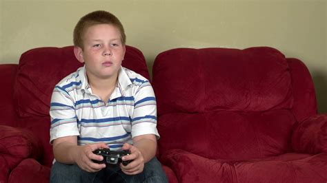Boy Gets Upset Playing Video Game Stock Video Footage 0021 Sbv