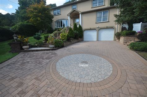 This Golden Brown Paving Stone Colored Driveway And Door Steps Was