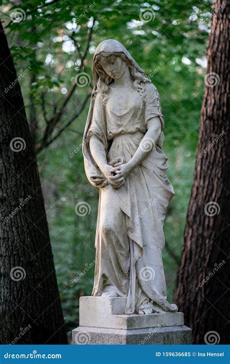 Stone Statue Of A Mourning Woman As Decoration On A Graveyard Stock Image Image Of Grief