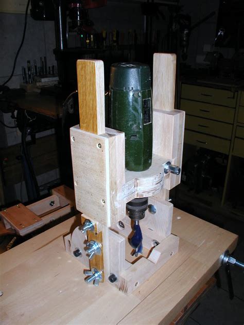 Each hole has a metal bushing in it to protect the jig from being use a drill press to drill the holes through the jig (image 1). Ryszard's homemade drill guide