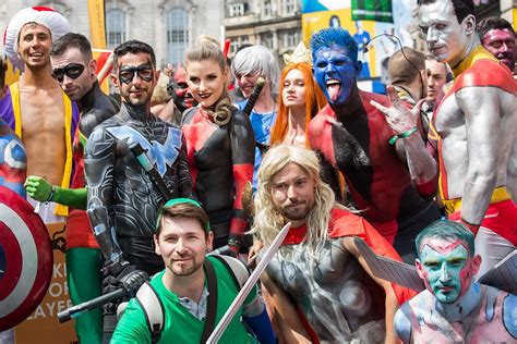 the parade of the pride in london festival attracts thousands of people all over the world to