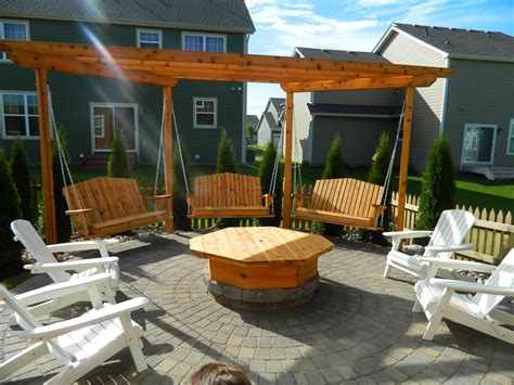 Use a tape measure to determine fire pit and pergola radius, mark the points (*materials specified are for a 4' fire pit radius and 12' pergola radius). Other Hardscaping Services | Devine Design Hardscapes