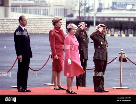 Queen Elizabeth Ii With King Hussein And Behind The Duke Of Edinburgh And Queen Noor Taking