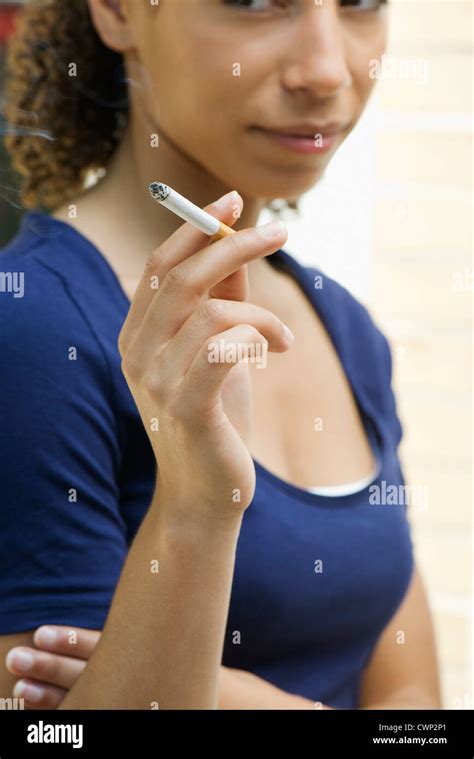 Young Woman Smoking Cigarette Stock Photo Alamy