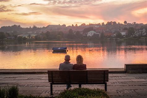 Two Person Sitting On Bench · Free Stock Photo