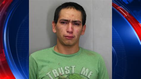 man wearing ‘trust me shirt arrested along with another suspect for stealing car queen city news