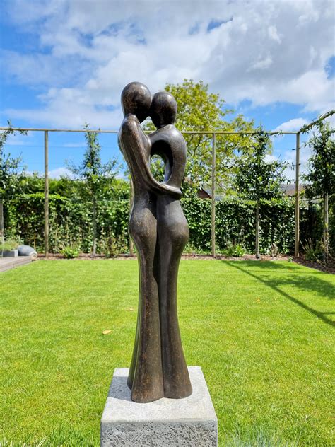 Bronze Garden Sculpture Of An Embracing Couple Abstract And Modern Romantic Garden Statues