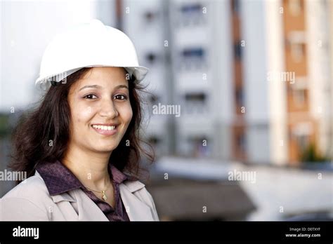 Portrait Of Smiling Indian Female Construction Architect Stock Photo