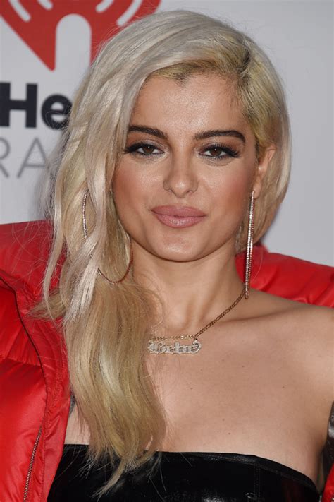 Bebe Rexha Wavy Platinum Blonde Dark Roots Long Layers Side Part Hairstyle Steal Her Style