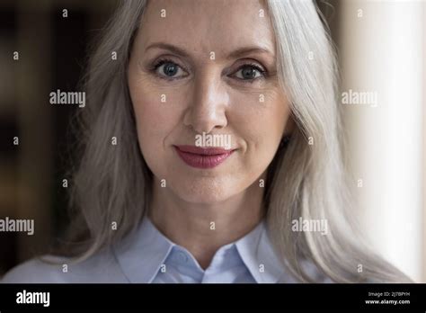 Positive Confident Beautiful Mature Woman Head Shot Close Up Stock Photo Alamy