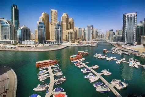 Dubai Marina Boat Tour And Burj Khalifa Dinner Introducing Dubai