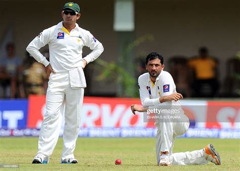 Pakistan Cricketer Junaid Khan And Teammate Saeed Ajmal Look On News Photo Getty Images