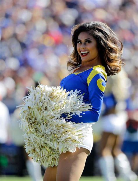 A Member Of The Los Angeles Rams Cheerleader Team Perform During The