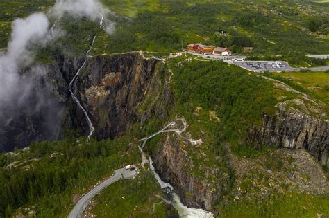 Step Bridge Spans Gorge Above Norways Voringsfossen Waterfall