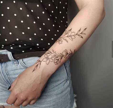 wrap around wrist tattoos wrap around tattoo flower wrist tattoos vine tattoos elbow tattoos