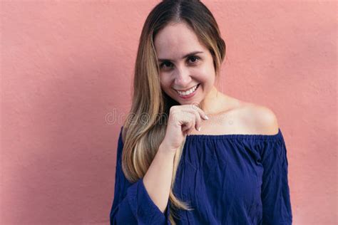 Young Woman Smiling With Her Hand On Her Chin Stock Photo Image Of