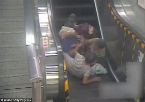 Pensioner Tumbles Down An Escalator While Carrying Her Grandson And