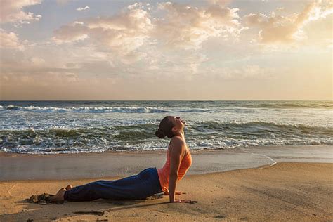 Yoga Bending Over Backwards Beach Women Stock Photos Pictures