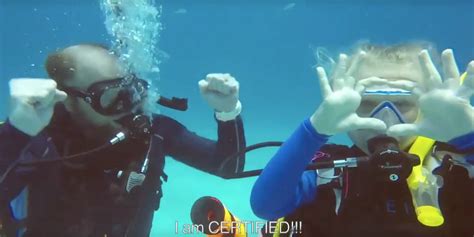 Father Daughter Diving With Sign Language