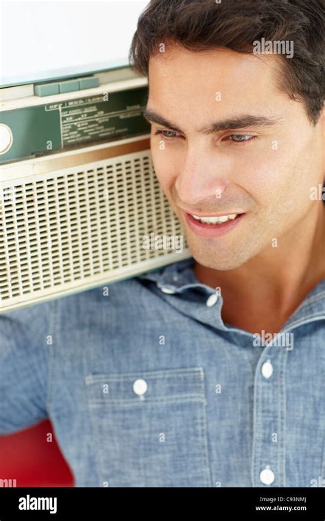 Person Listening To Transistor Radio Hi Res Stock Photography And
