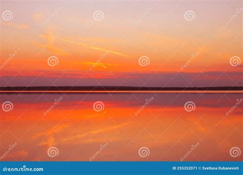 Reflection Of A Beautiful Sunset Over The Water Stock Image Image Of