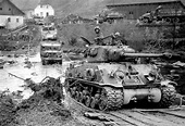 Tanks of the American 11th Armored Division crossing the Muhl River ...