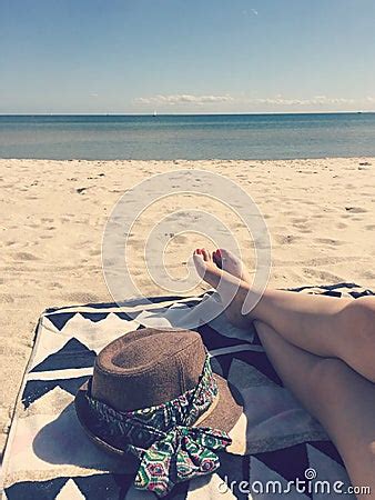 Lady Sunbathing At The Beach Editorial Stock Photo Image 69249973