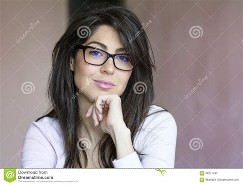 Portrait Of Beautiful Young Smiling Woman With Modern Eyeglasses Stock