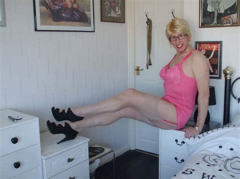 Miss Moorcock Loves To Expose Herself At Home In Her Pink Corselette Photo 3
