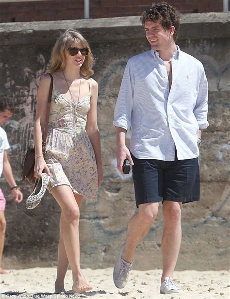 Taylor Swift Takes Time Out For A Beach Stroll With Her Brother Austin
