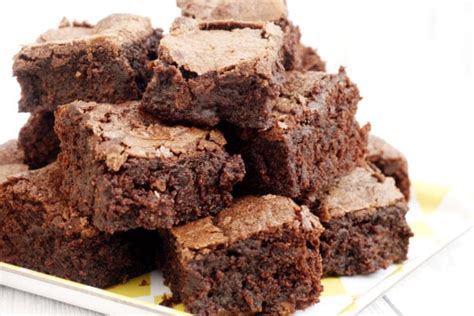 A Stack Of Mary Berrys Chocolate Brownies On A Plate