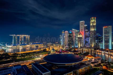 Cityscape Of Singapore City Sunrise And Building In Morning Time