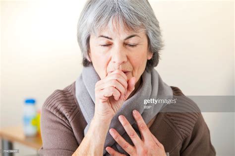 Elderly Person Coughing High Res Stock Photo Getty Images