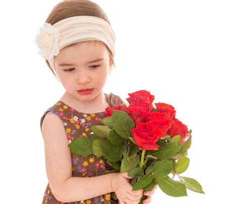 Little Girl With A Bouquet Of Red Roses Stock Photo Image Of Hand