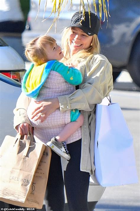 Hilary Duff Shows Off Her Toned Arms In A Sporty Outfit While Shopping