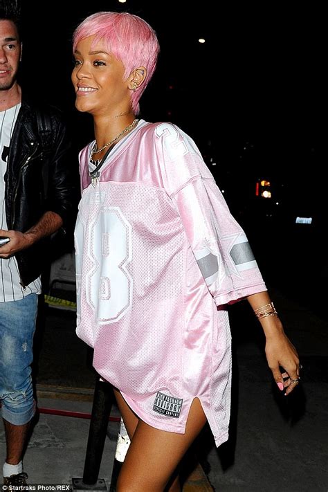 Rihanna Shows Off Her Slender Legs In Pink Oversized Baseball Jersey