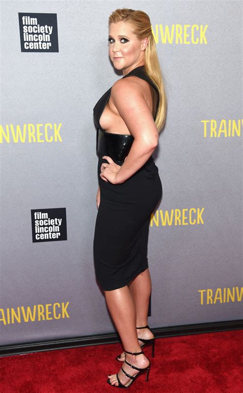 amy schumer has some sexy side boob peeking out at the trainwreck premiere take a look e news