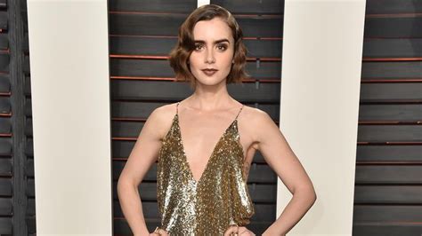 Lily Collins Strips Down To Find Perfect Gown For The Golden Globes