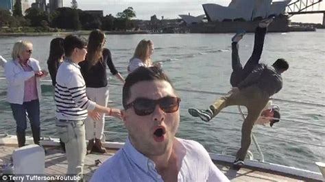 selfie stick fight sees one man tossed into sydney harbour daily mail online