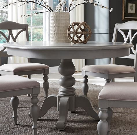 1 dining table, 6 dining chairs gray soft velvet fabric thick white tempered glass top stainless steel table base cabriole shaped legs. Summer House Dove Grey Round Extendable Dining Table from ...
