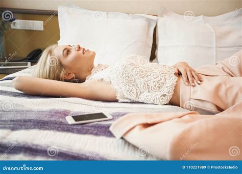 Businesswoman Relaxing In Hotel Room Stock Image Image Of Candid