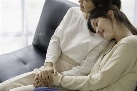Happy Lgbtq Asian Lesbian Couple Two Asian Girls Show Their Love By Cuddling At Home Stock