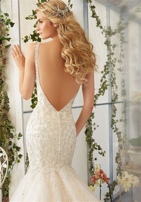 Our mermaid & trumpet wedding dresses come in a variety of sizes & styles, including lace. Intricate Crystal Beaded Embroidery on Tulle Mermaid ...