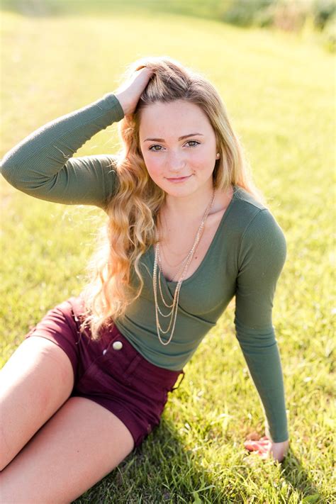 Senior Girl Wearing Green Top And Red Shorts Country Styled High