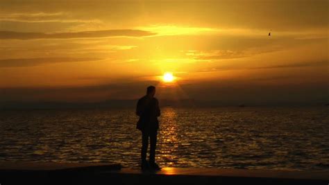Lonely Man At Sunset Stock Footage Video 100 Royalty