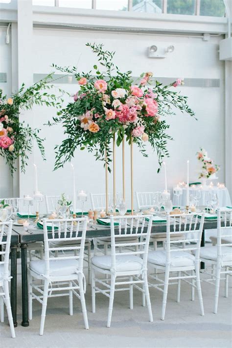 Organic Greenery And Shades Of Pink Tall Centerpiece Photo By